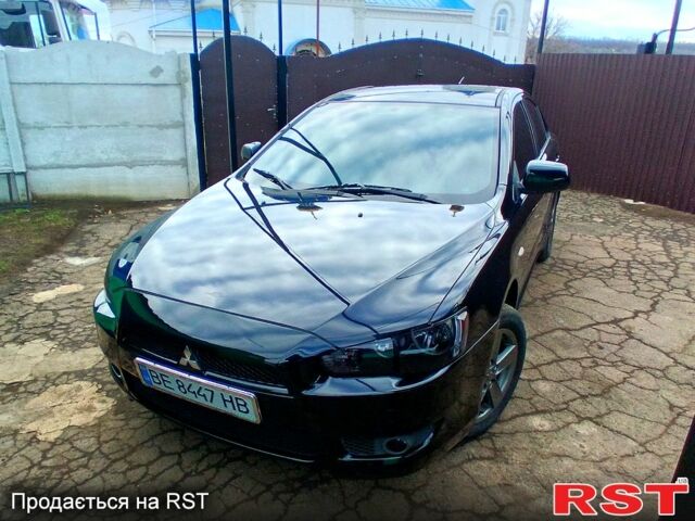 Чорний Міцубісі Lancer, об'ємом двигуна 2 л та пробігом 202 тис. км за 7500 $, фото 1 на Automoto.ua