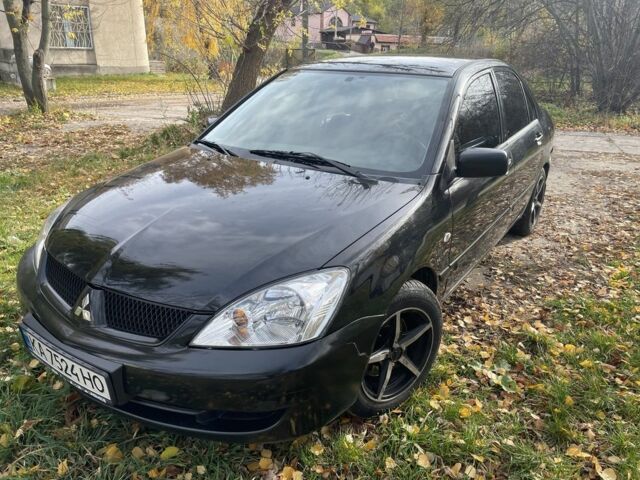 Міцубісі Lancer 2007 у Каневе на Automoto.ua Чорний Міцубісі Lancer, об'ємом двигуна 1.6 л та пробігом 310 тис. км за 4100 $, фото 1 на Automoto.ua