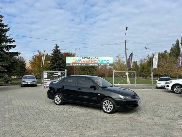 Мицубиси Лансер 2007 в Кривом Роге на Automoto.ua Черный Мицубиси Лансер, объемом двигателя 2 л и пробегом 143 тыс. км за 5400 $, фото 1 на Automoto.ua