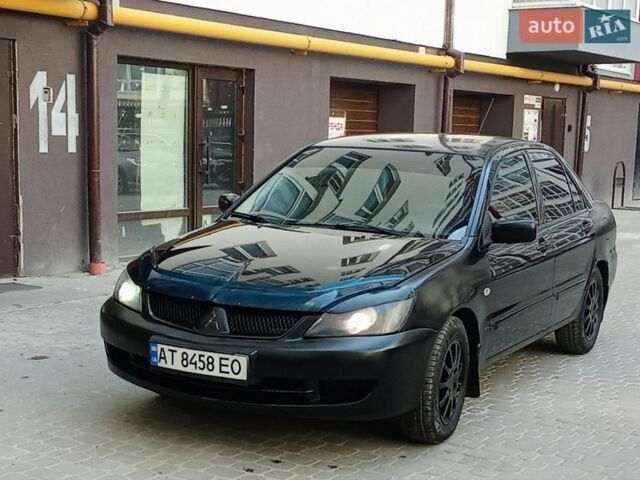 Чорний Міцубісі Lancer, об'ємом двигуна 1.58 л та пробігом 269 тис. км за 3150 $, фото 1 на Automoto.ua
