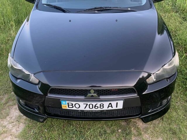 Чорний Міцубісі Lancer, об'ємом двигуна 2 л та пробігом 208 тис. км за 4455 $, фото 1 на Automoto.ua