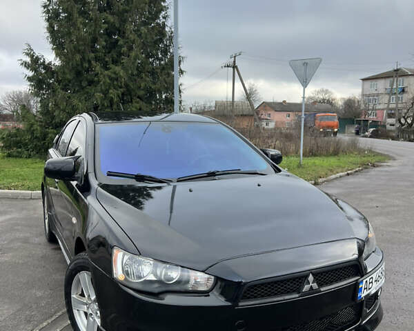 Черный Мицубиси Лансер, объемом двигателя 2 л и пробегом 350 тыс. км за 6700 $, фото 1 на Automoto.ua
