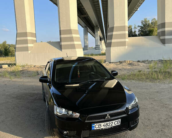 Чорний Міцубісі Lancer, об'ємом двигуна 2 л та пробігом 230 тис. км за 6700 $, фото 1 на Automoto.ua