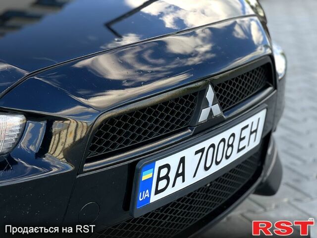 Чорний Міцубісі Lancer, об'ємом двигуна 2 л та пробігом 205 тис. км за 6500 $, фото 1 на Automoto.ua