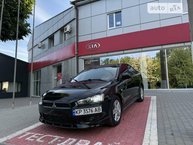 Чорний Міцубісі Lancer, об'ємом двигуна 2 л та пробігом 200 тис. км за 6900 $, фото 1 на Automoto.ua