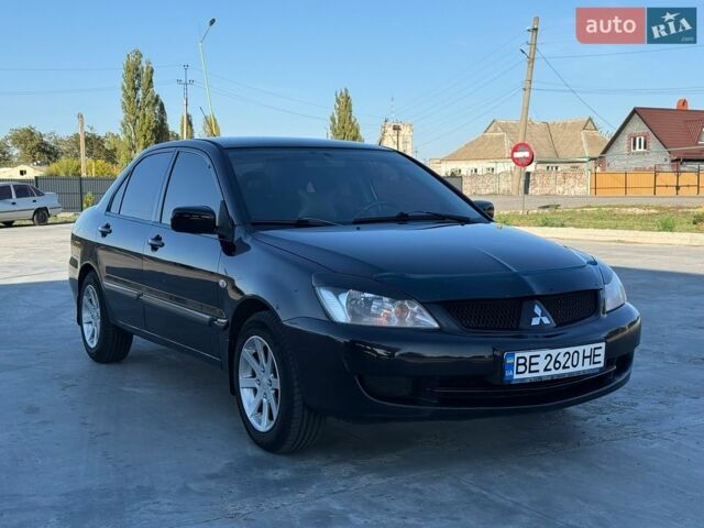 Чорний Міцубісі Lancer, об'ємом двигуна 1.58 л та пробігом 261 тис. км за 3650 $, фото 1 на Automoto.ua