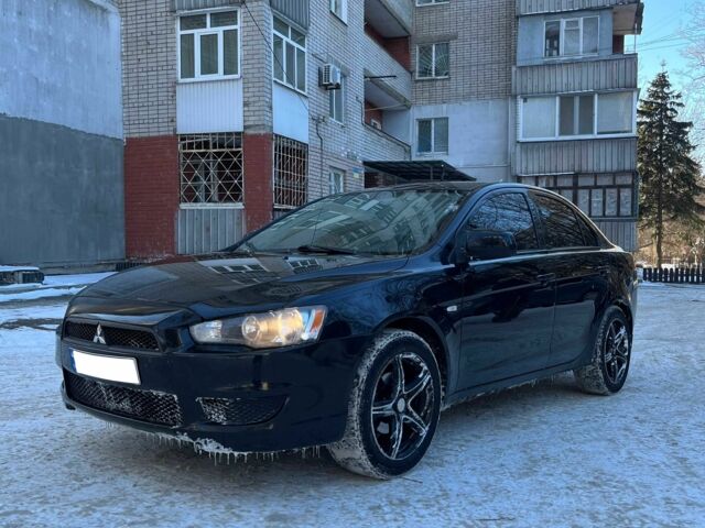 Чорний Міцубісі Lancer, об'ємом двигуна 1.5 л та пробігом 215 тис. км за 5299 $, фото 1 на Automoto.ua