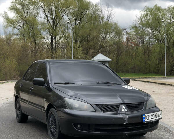 Чорний Міцубісі Lancer, об'ємом двигуна 1.6 л та пробігом 243 тис. км за 3300 $, фото 1 на Automoto.ua