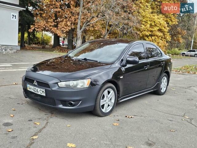 Міцубісі Lancer 2007 у Києві на Automoto.ua Чорний Міцубісі Lancer, об'ємом двигуна 2 л та пробігом 115 тис. км за 5000 $, фото 1 на Automoto.ua