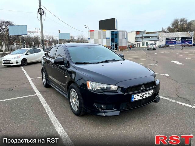 Чорний Міцубісі Lancer, об'ємом двигуна 2 л та пробігом 246 тис. км за 7300 $, фото 1 на Automoto.ua
