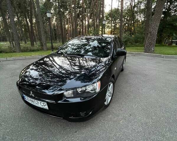 Чорний Міцубісі Lancer, об'ємом двигуна 2 л та пробігом 230 тис. км за 6800 $, фото 1 на Automoto.ua