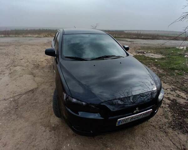Чорний Міцубісі Lancer, об'ємом двигуна 2 л та пробігом 202 тис. км за 7800 $, фото 1 на Automoto.ua