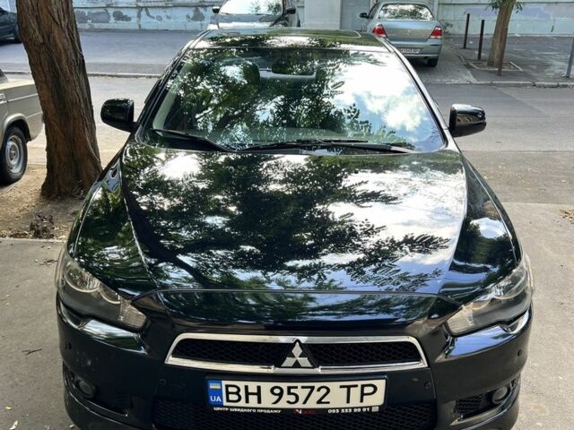 Чорний Міцубісі Lancer, об'ємом двигуна 2 л та пробігом 131 тис. км за 7200 $, фото 1 на Automoto.ua