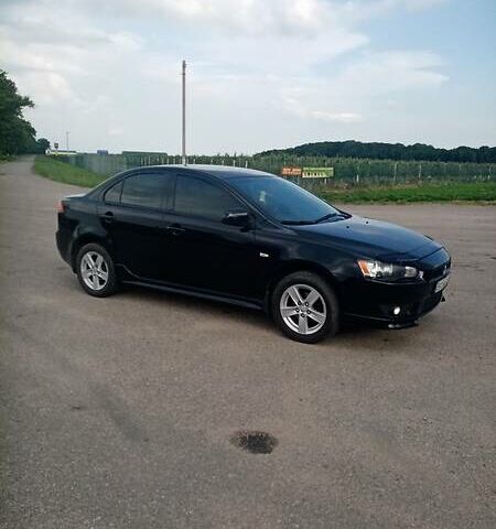 Чорний Міцубісі Lancer, об'ємом двигуна 2 л та пробігом 161 тис. км за 7600 $, фото 1 на Automoto.ua