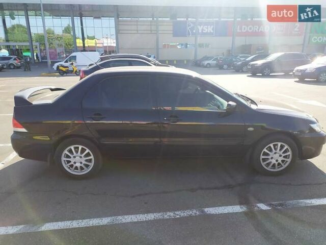 Черный Мицубиси Лансер, объемом двигателя 0 л и пробегом 160 тыс. км за 5100 $, фото 1 на Automoto.ua