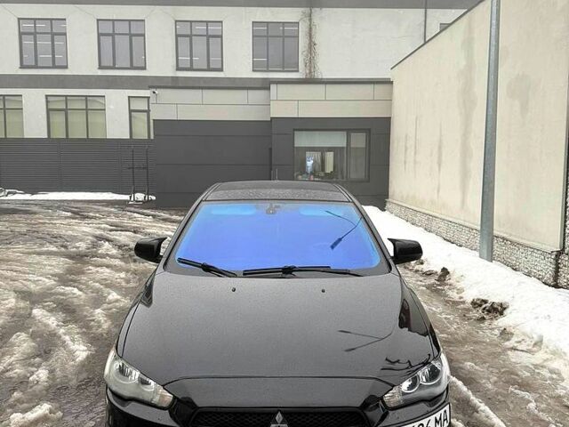Чорний Міцубісі Lancer, об'ємом двигуна 2 л та пробігом 1610 тис. км за 7500 $, фото 1 на Automoto.ua