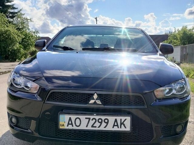 Чорний Міцубісі Lancer, об'ємом двигуна 2 л та пробігом 374 тис. км за 4600 $, фото 1 на Automoto.ua