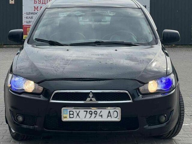 Черный Мицубиси Лансер, объемом двигателя 2 л и пробегом 350 тыс. км за 4299 $, фото 1 на Automoto.ua