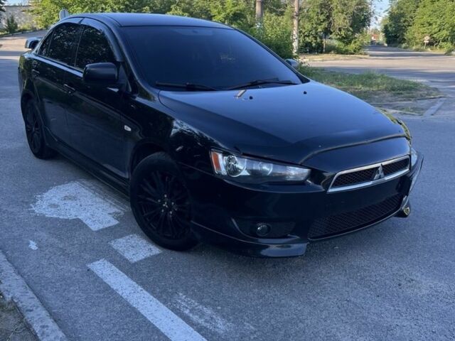 Чорний Міцубісі Lancer, об'ємом двигуна 2 л та пробігом 240 тис. км за 6001 $, фото 1 на Automoto.ua