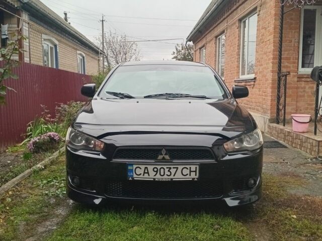 Чорний Міцубісі Lancer, об'ємом двигуна 2 л та пробігом 273 тис. км за 7100 $, фото 1 на Automoto.ua