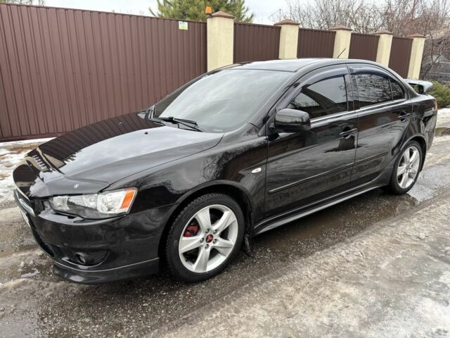 Чорний Міцубісі Lancer, об'ємом двигуна 2 л та пробігом 188 тис. км за 6300 $, фото 1 на Automoto.ua