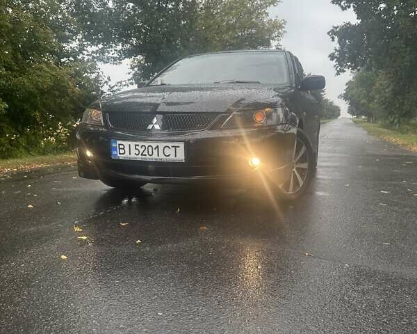 Чорний Міцубісі Lancer, об'ємом двигуна 1.6 л та пробігом 310 тис. км за 5100 $, фото 1 на Automoto.ua