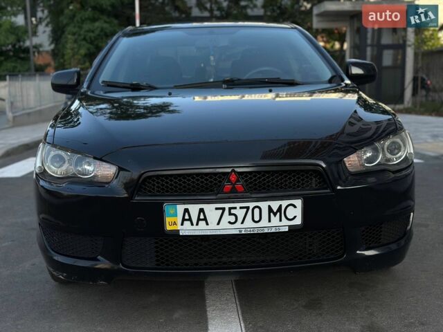 Черный Мицубиси Лансер, объемом двигателя 1.5 л и пробегом 227 тыс. км за 5000 $, фото 1 на Automoto.ua