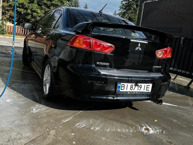 Чорний Міцубісі Lancer, об'ємом двигуна 2 л та пробігом 225 тис. км за 5200 $, фото 1 на Automoto.ua