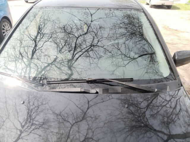 Черный Мицубиси Лансер, объемом двигателя 1.6 л и пробегом 256 тыс. км за 5000 $, фото 1 на Automoto.ua