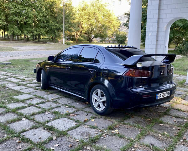 Чорний Міцубісі Lancer, об'ємом двигуна 2 л та пробігом 280 тис. км за 5200 $, фото 1 на Automoto.ua