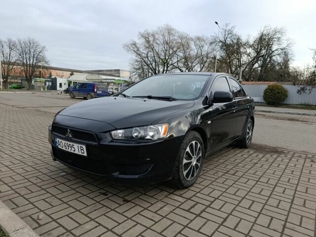 Черный Мицубиси Лансер, объемом двигателя 1.5 л и пробегом 300 тыс. км за 4000 $, фото 1 на Automoto.ua