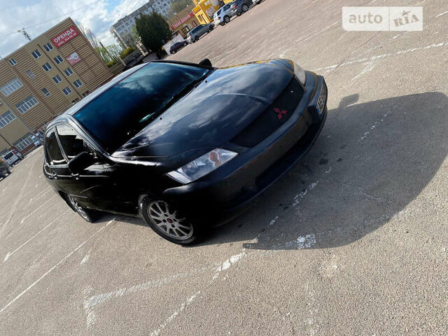 Чорний Міцубісі Lancer, об'ємом двигуна 1.6 л та пробігом 195 тис. км за 5200 $, фото 1 на Automoto.ua