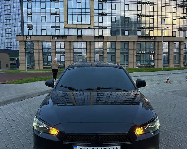 Черный Мицубиси Лансер, объемом двигателя 2 л и пробегом 245 тыс. км за 6200 $, фото 1 на Automoto.ua