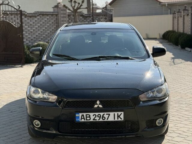 Черный Мицубиси Лансер, объемом двигателя 2 л и пробегом 229 тыс. км за 5300 $, фото 1 на Automoto.ua