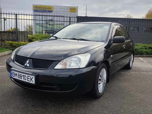 Чорний Міцубісі Lancer, об'ємом двигуна 1.58 л та пробігом 202 тис. км за 4700 $, фото 1 на Automoto.ua