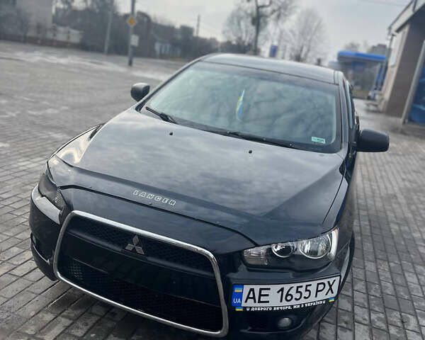 Чорний Міцубісі Lancer, об'ємом двигуна 2 л та пробігом 188 тис. км за 6600 $, фото 1 на Automoto.ua