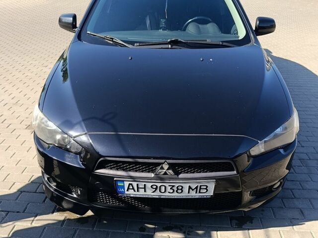 Чорний Міцубісі Lancer, об'ємом двигуна 2 л та пробігом 141 тис. км за 6300 $, фото 1 на Automoto.ua