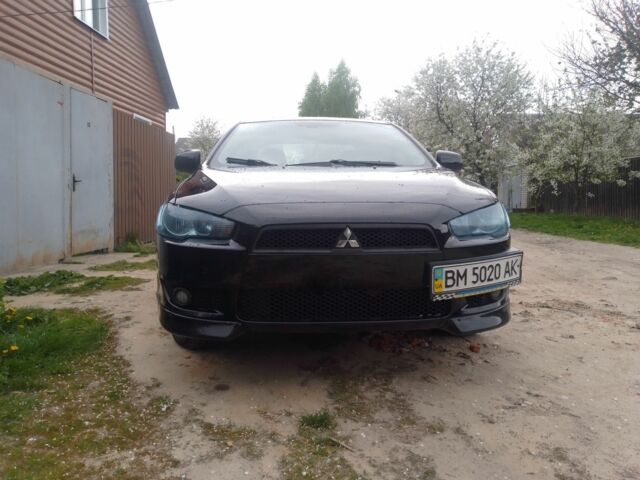 Чорний Міцубісі Lancer, об'ємом двигуна 2 л та пробігом 320 тис. км за 6500 $, фото 1 на Automoto.ua