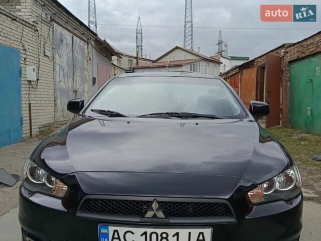 Черный Мицубиси Лансер, объемом двигателя 1.5 л и пробегом 186 тыс. км за 6900 $, фото 1 на Automoto.ua