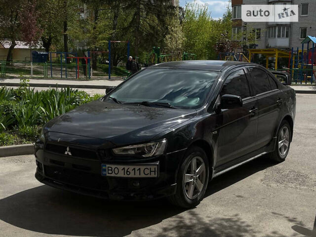 Чорний Міцубісі Lancer, об'ємом двигуна 2 л та пробігом 178 тис. км за 7500 $, фото 1 на Automoto.ua