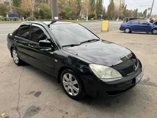 Мицубиси Лансер 2008 в Харькове на Automoto.ua Черный Мицубиси Лансер, объемом двигателя 1.6 л и пробегом 245 тыс. км за 4300 $, фото 1 на Automoto.ua