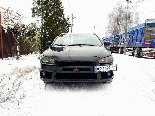 Чорний Міцубісі Lancer, об'ємом двигуна 2 л та пробігом 208 тис. км за 9500 $, фото 1 на Automoto.ua