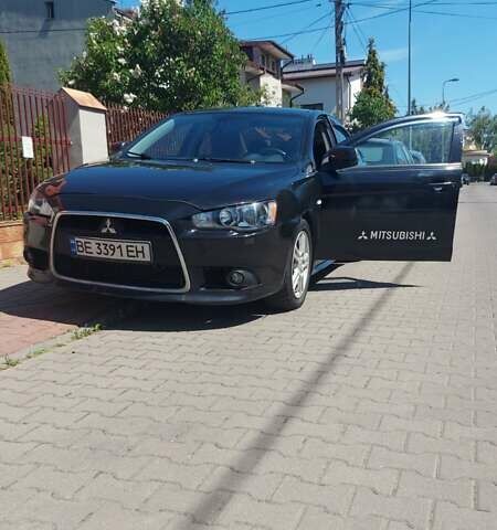 Чорний Міцубісі Lancer, об'ємом двигуна 2 л та пробігом 257 тис. км за 5500 $, фото 1 на Automoto.ua