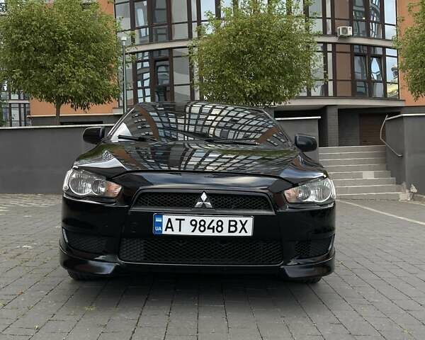 Черный Мицубиси Лансер, объемом двигателя 1.5 л и пробегом 236 тыс. км за 5000 $, фото 1 на Automoto.ua