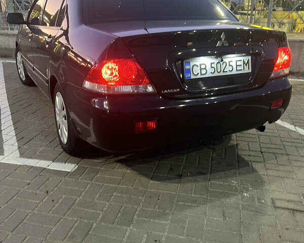 Черный Мицубиси Лансер, объемом двигателя 1.6 л и пробегом 167 тыс. км за 4850 $, фото 1 на Automoto.ua