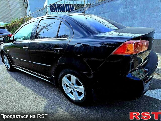 Чорний Міцубісі Lancer, об'ємом двигуна 2 л та пробігом 300 тис. км за 6600 $, фото 1 на Automoto.ua