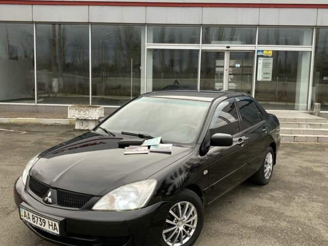 Черный Мицубиси Лансер, объемом двигателя 1.6 л и пробегом 350 тыс. км за 4500 $, фото 1 на Automoto.ua