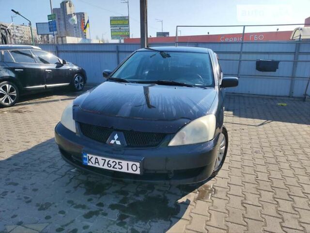 Чорний Міцубісі Lancer, об'ємом двигуна 1.6 л та пробігом 335 тис. км за 3100 $, фото 1 на Automoto.ua