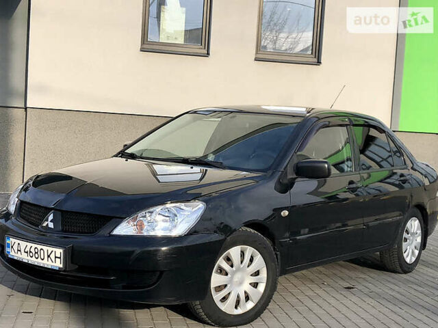 Чорний Міцубісі Lancer, об'ємом двигуна 1.6 л та пробігом 173 тис. км за 4450 $, фото 1 на Automoto.ua