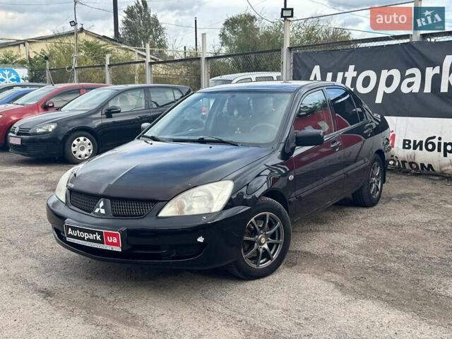 Мицубиси Лансер 2008 в Запорожье на Automoto.ua Черный Мицубиси Лансер, объемом двигателя 1.6 л и пробегом 316 тыс. км за 4290 $, фото 1 на Automoto.ua